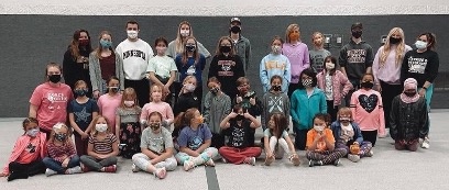 a group of people wearing face masks