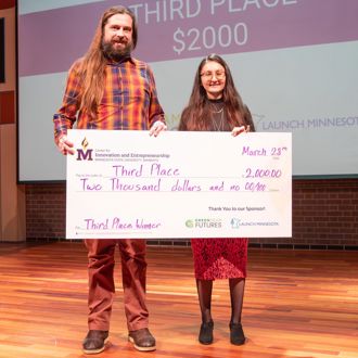 Minnesota State University, Mankato STEM Track student winners posing for a group photo with a giant check at the 2025 FutureSolvers Cultivation Challenge for third place Open Soil