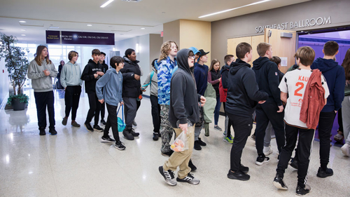 A group of students entering the CSU southeast ballroom after a guided campus tour with the College of Business SET Ambassadors