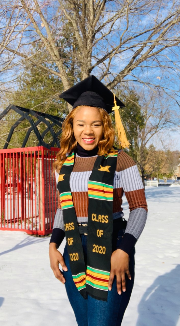 a person wearing a graduation cap and scarf