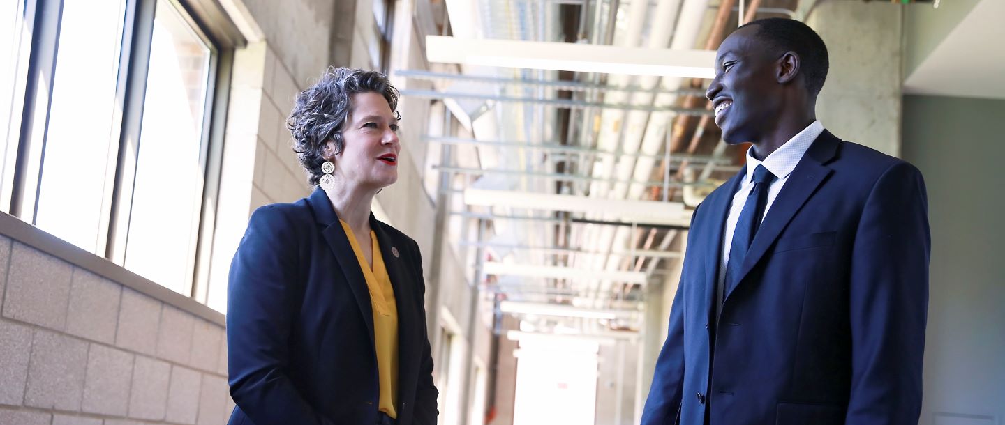 Photo of Dean Flannery and student